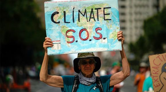 climate sos pancarta reuters 580x321