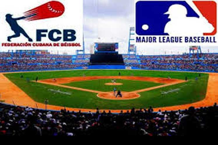 Imaen alegórica al acuerdo de negociación de la Federación Cubana de Béisbol con las Grandes Ligas de Estados Unidos.