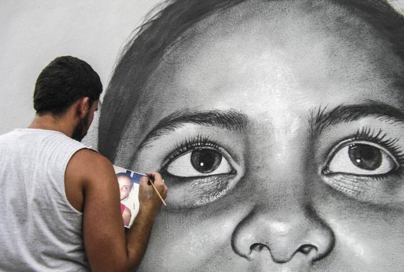  Murales urbanos representa rostros infantiles